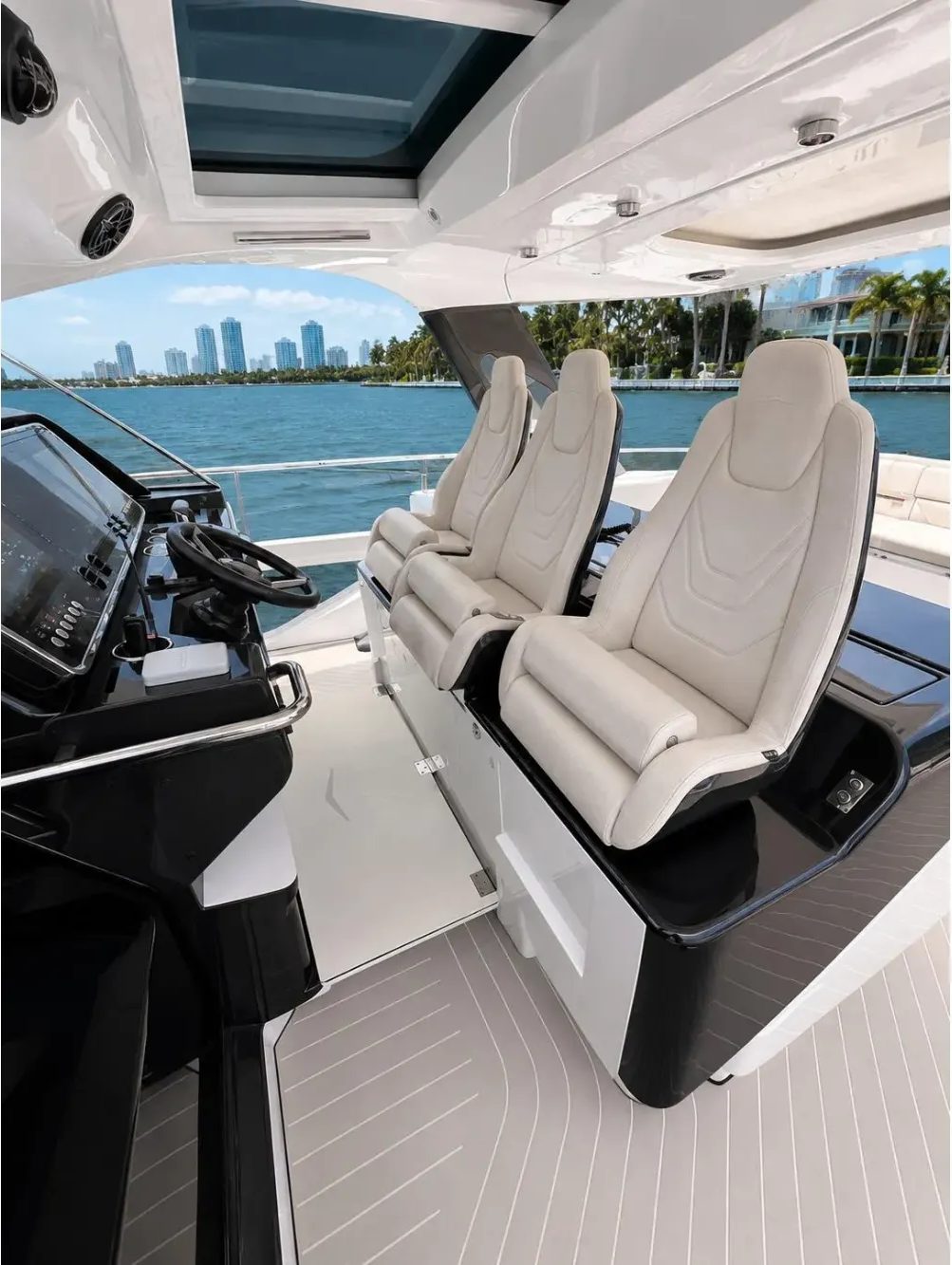 The helm seats and cockpit under the hardtop